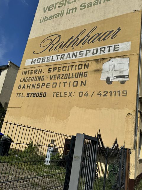 Alte Werbewand: Rothhaar GmbH Möbeltransporte, internationale Spedition, Lagerung, Verzollung, Bahnspedition